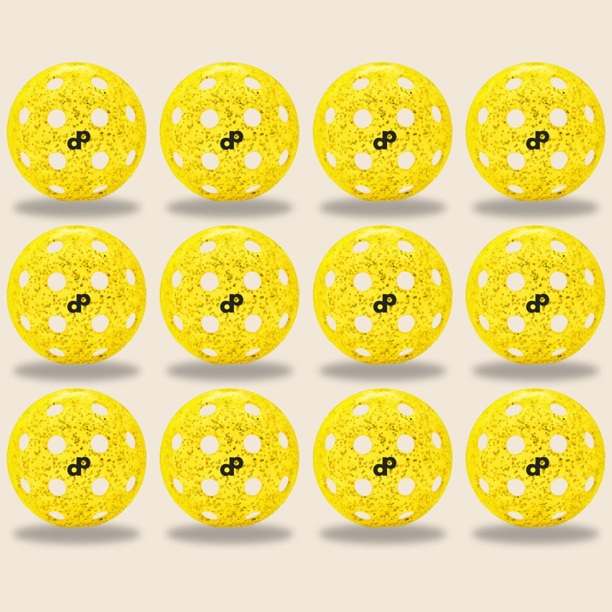 Twelve Dope Pickleball Co. Yellow Glitter-Infused Pickleball Balls with Enhanced Visibility and evenly spaced holes, each featuring a speckled texture and black OP logo, are arranged in a 3x4 grid on a light background.
